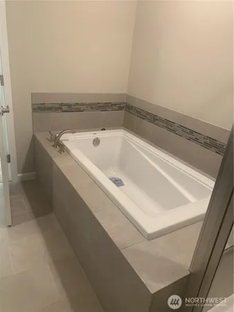 a bathroom with a bathtub