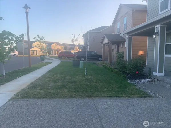 a house view with a garden space
