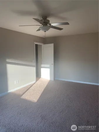 a an empty room with a fireplace