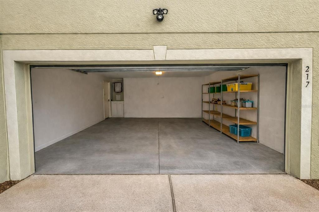 217 Tres Reyes Lane Groveland, FL 34736 - Photo 20 of 20 a view of a garage door