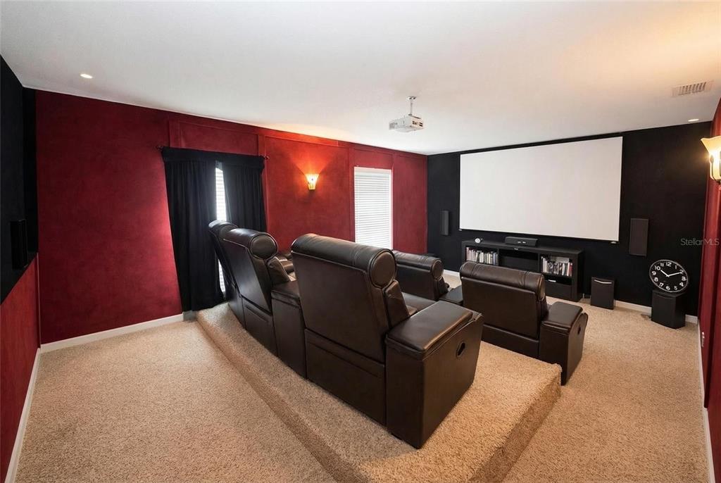 217 Tres Reyes Lane Groveland, FL 34736 - Photo 10 of 20 a living room with furniture and a flat screen tv