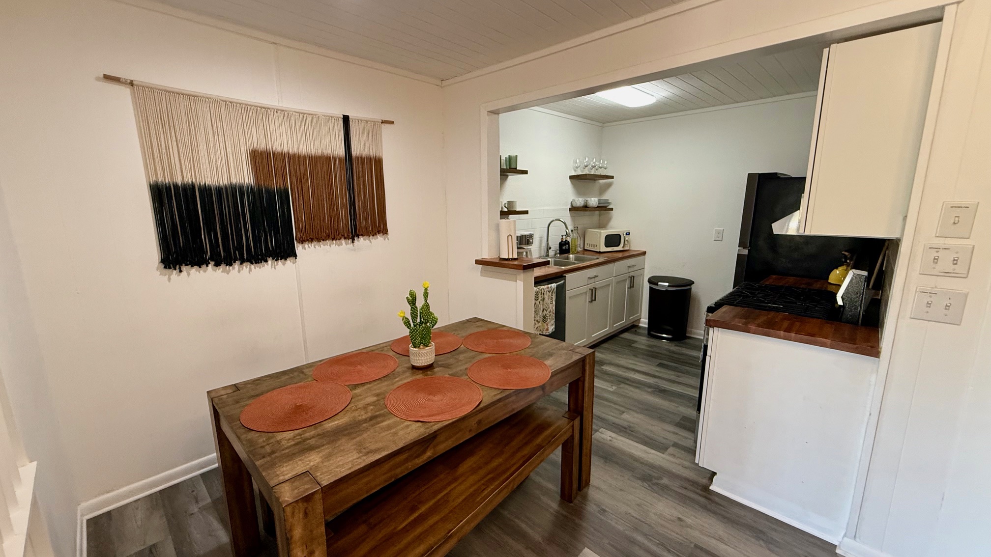 1802 East University Avenue, Unit A Georgetown, TX 78626 - Photo 20 of 23 Dining room featuring dark wood-style flooring and wood ceiling