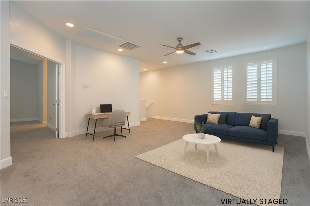 971 Huntington Cove Parkway Las Vegas, NV 89178 - Photo 25 of 55 Living room featuring light colored carpet, recessed lighting, an office area, and a ceiling fan
