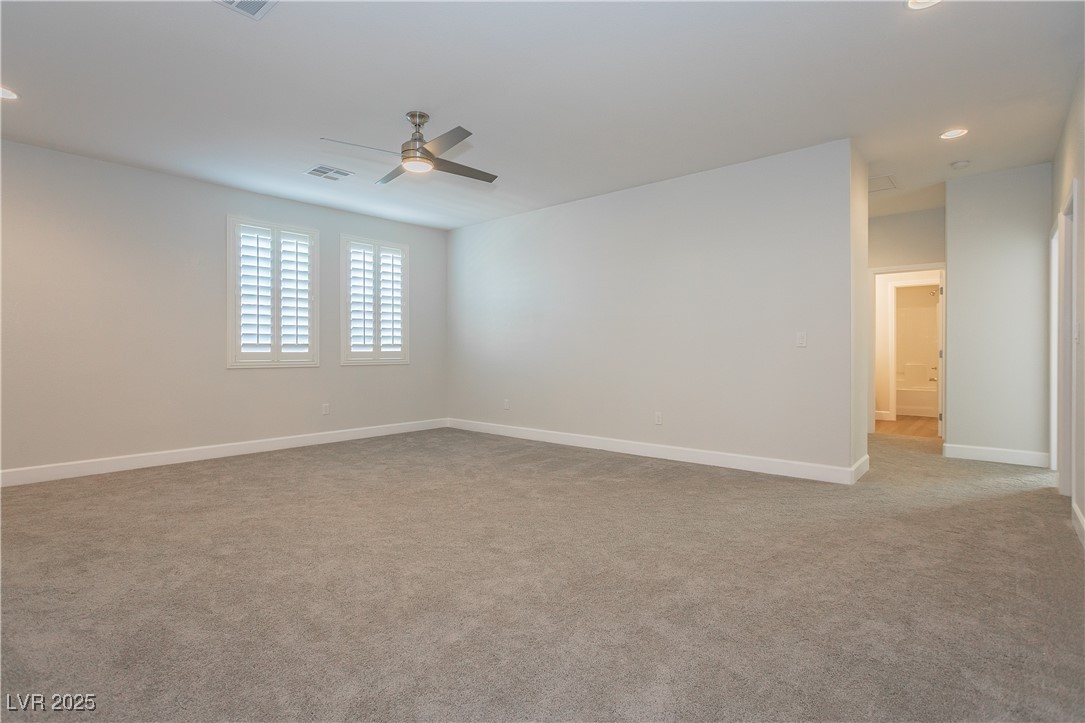971 Huntington Cove Parkway Las Vegas, NV 89178 - Photo 27 of 55 Carpeted spare room featuring ceiling fan and recessed lighting