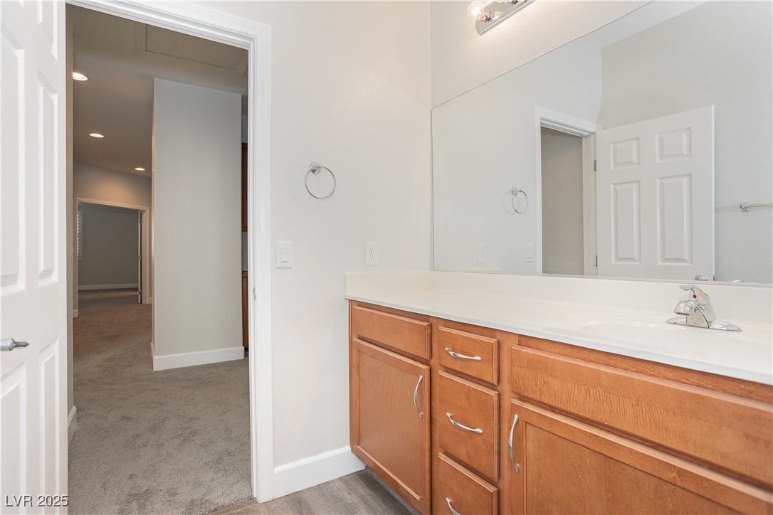 971 Huntington Cove Parkway Las Vegas, NV 89178 - Photo 38 of 55 Bathroom featuring vanity and baseboards