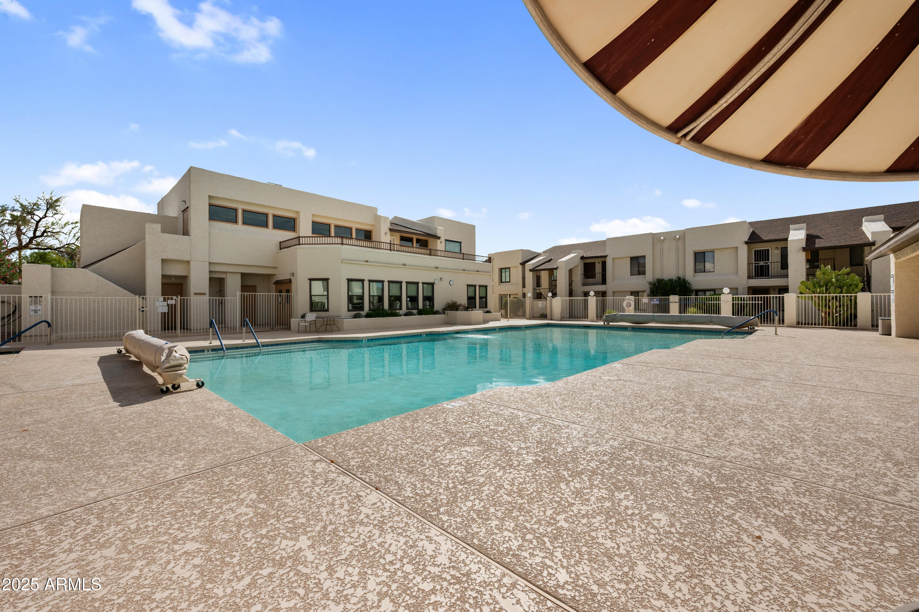 5518 East Lindstrom Lane, Unit 1011 Mesa, AZ 85215 - Photo 27 of 32 a view of a house with a big yard