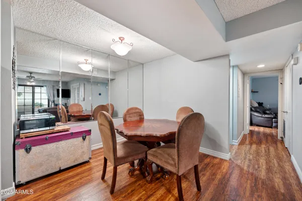 a kitchen with stainless steel appliances granite countertop a refrigerator stove and microwave