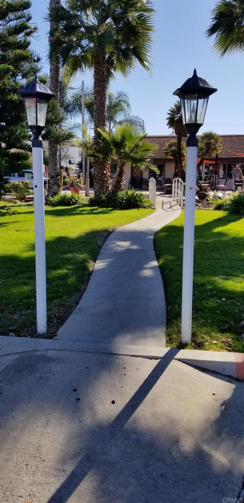 165 Roadrunner Lane Oceanside, CA 92057 - Photo 13 of 20 a house with swimming pool in front of it