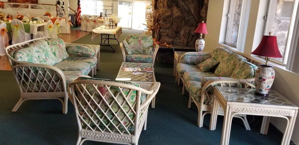 165 Roadrunner Lane Oceanside, CA 92057 - Photo 17 of 20 an outdoor living area with furniture and a floor to ceiling window