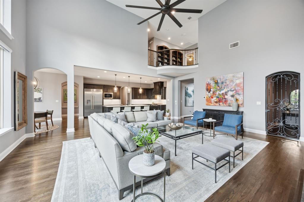 7121 Calypso Lane Frisco, TX 75036 - Photo 14 of 40 a living room with furniture and wooden floor