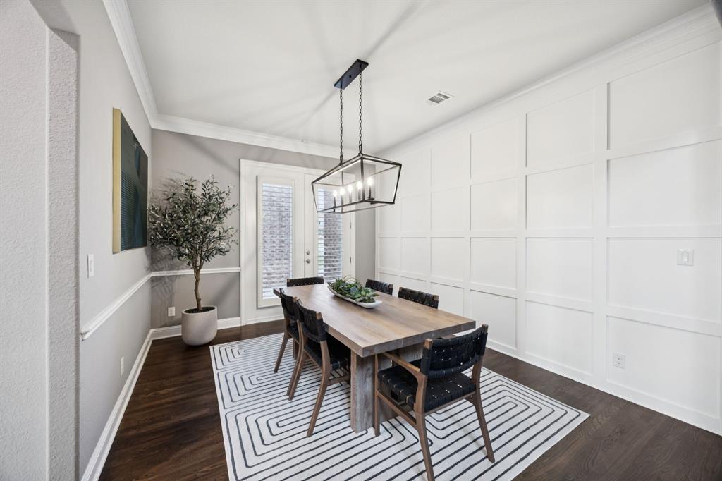 7121 Calypso Lane Frisco, TX 75036 - Photo 16 of 40 a view of a dining room with furniture window and wooden floor