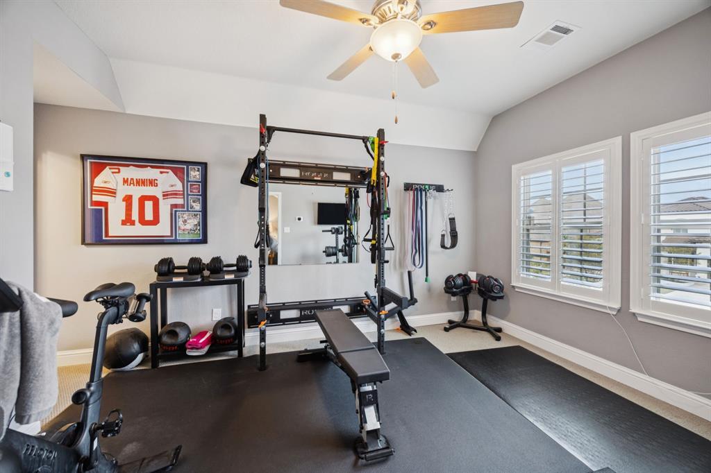 7121 Calypso Lane Frisco, TX 75036 - Photo 31 of 40 a view of a room with gym equipment