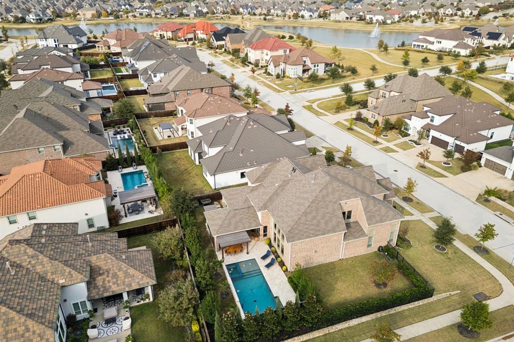 7121 Calypso Lane Frisco, TX 75036 - Photo 39 of 40 an aerial view of residential houses with outdoor space
