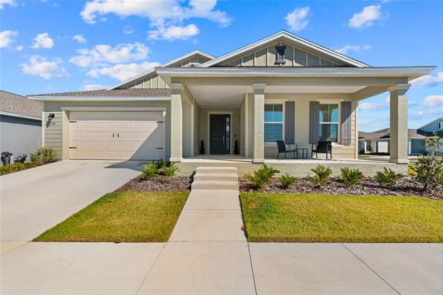 a front view of a house with swimming pool