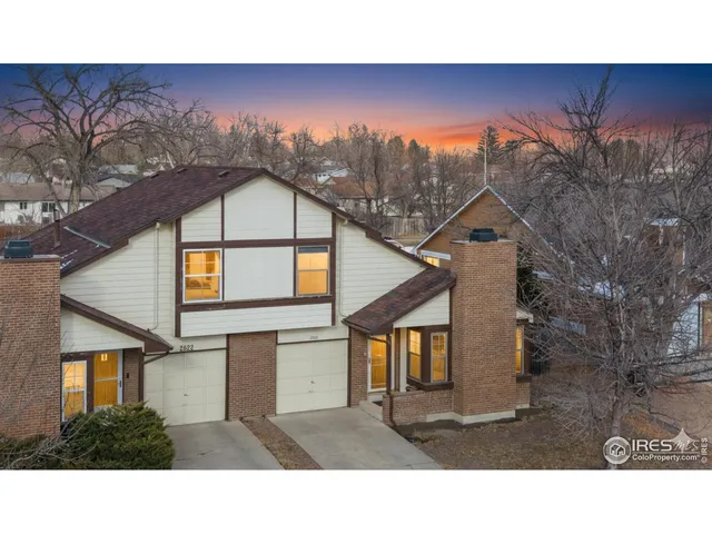 a black and white photo of a house