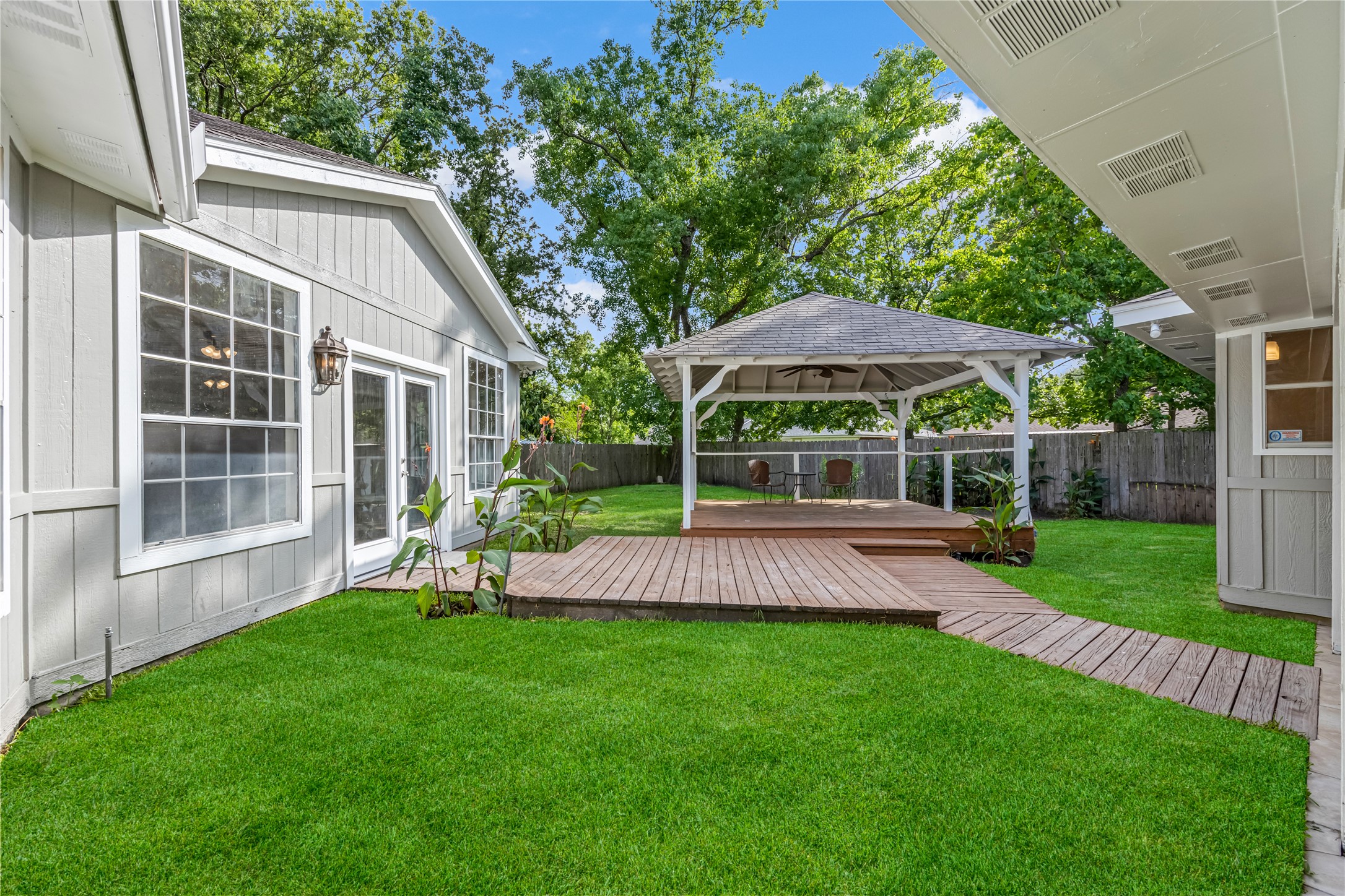 9806 Tanager Lane Conroe, TX 77385 - Photo 27 of 28 a view of outdoor space yard and patio