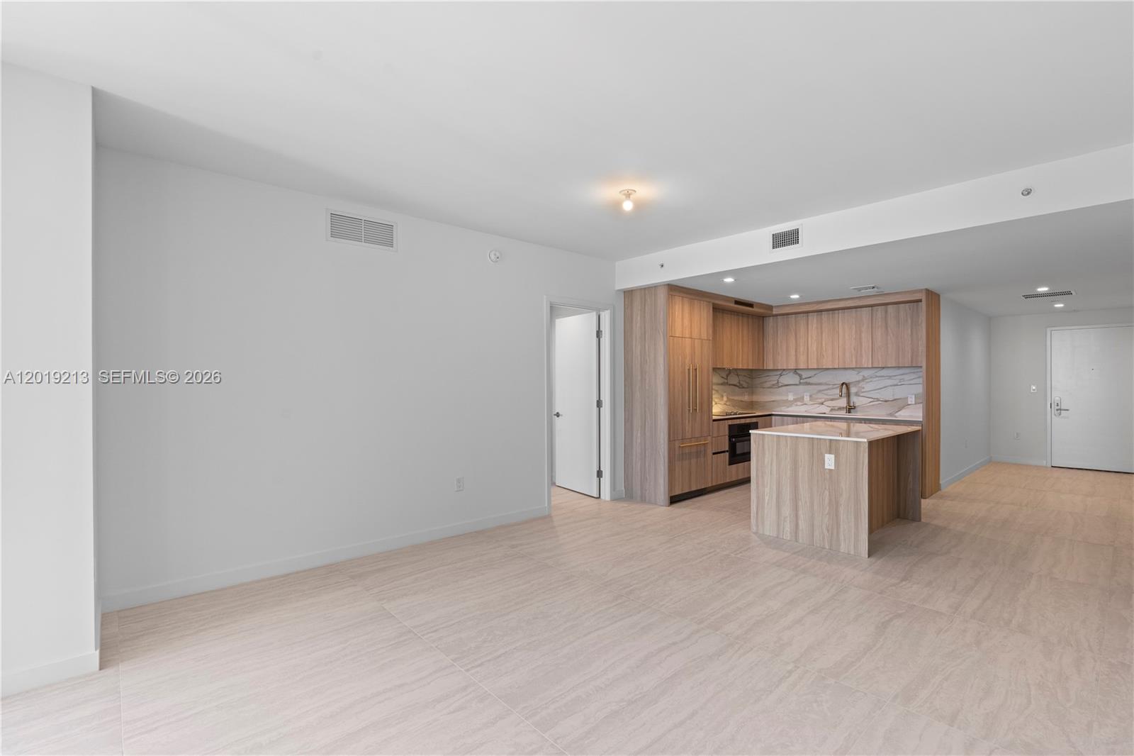 77 Southeast 5th, Unit 3702 Miami, FL 33131 - Photo 12 of 63 a view of a kitchen with a sink