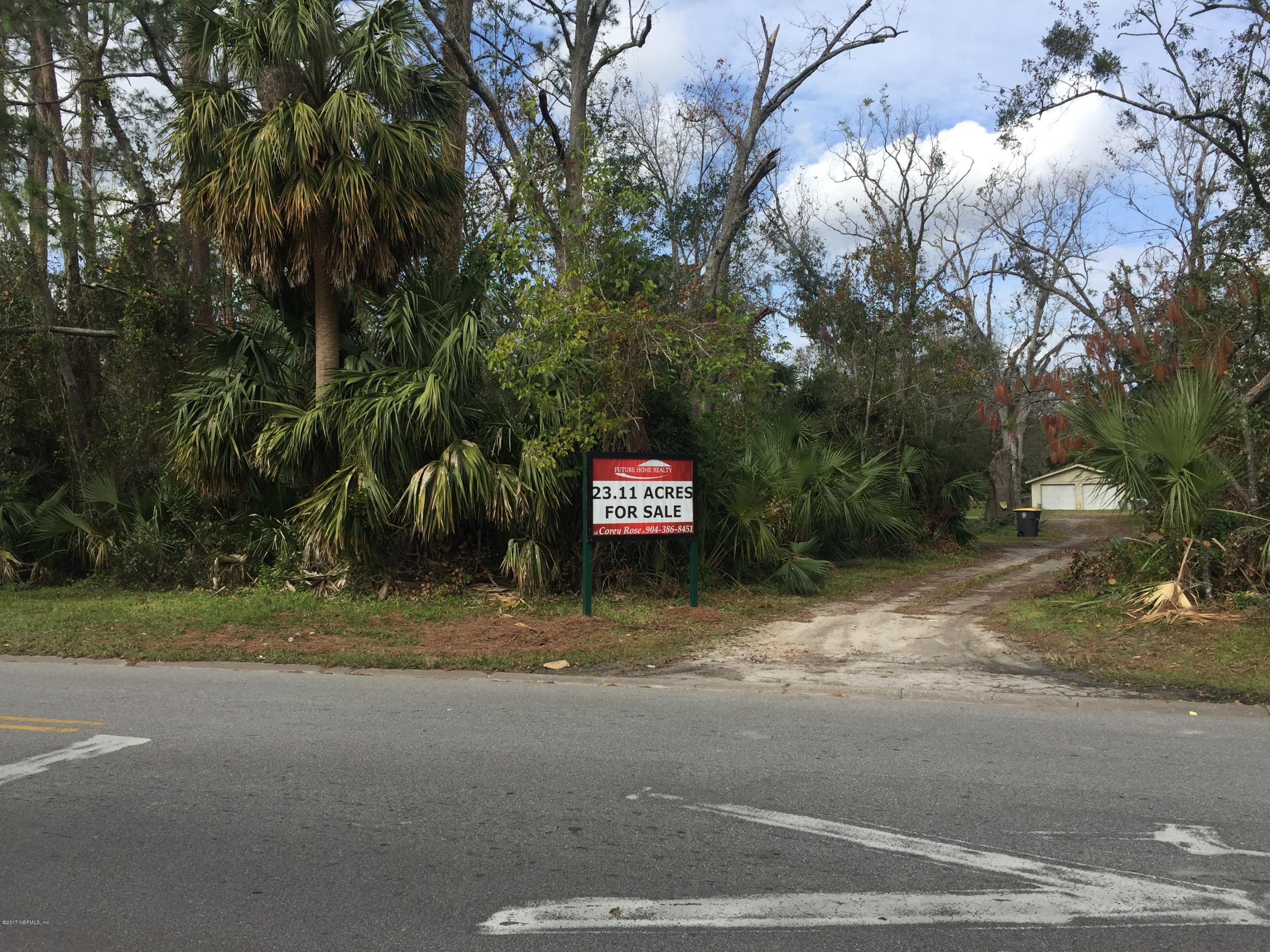 4527 Fennell Road Jacksonville, FL 32244 - Photo 12 of 38 a view of a street with a trees