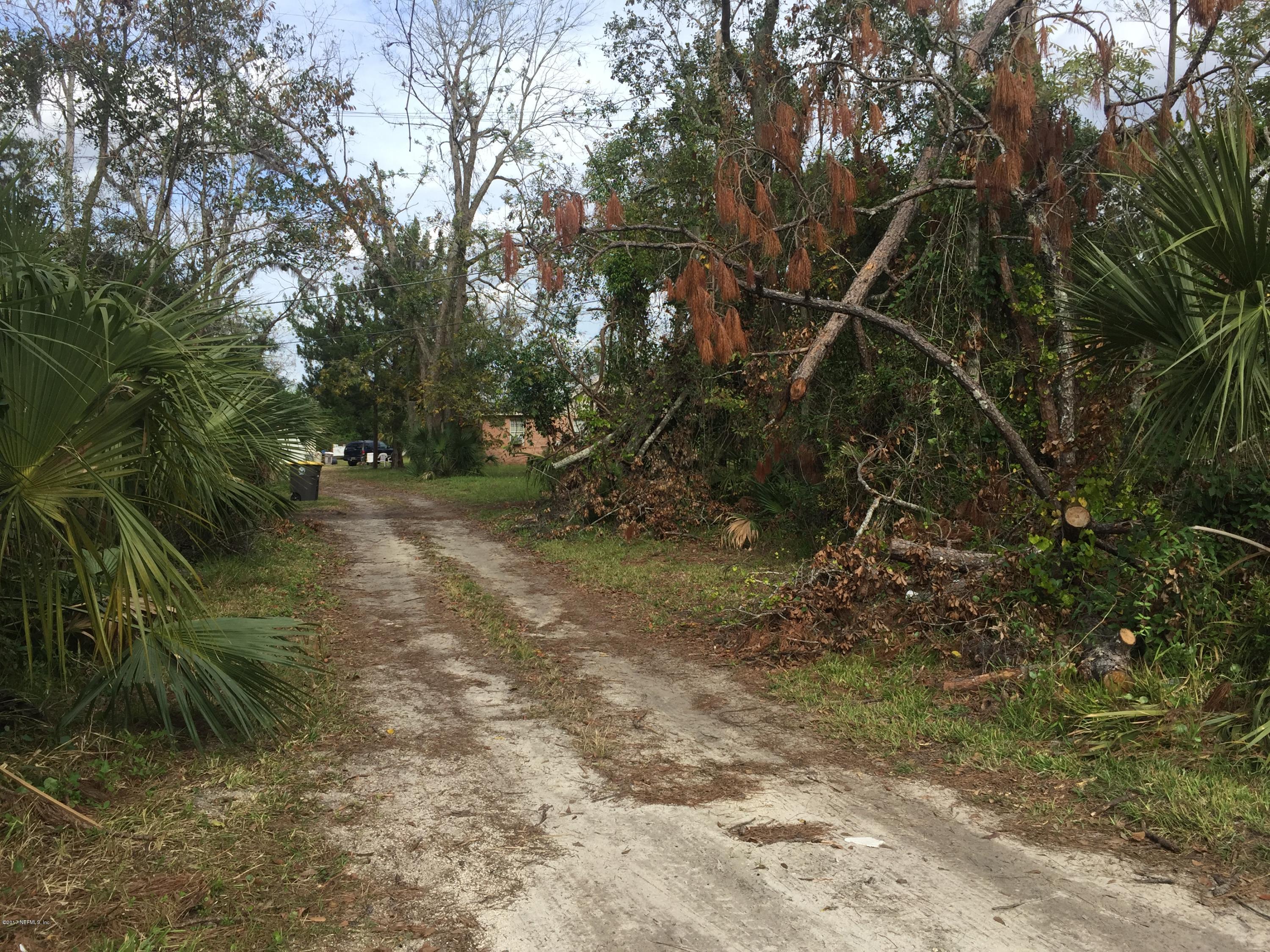 4527 Fennell Road Jacksonville, FL 32244 - Photo 13 of 38 a view of forest