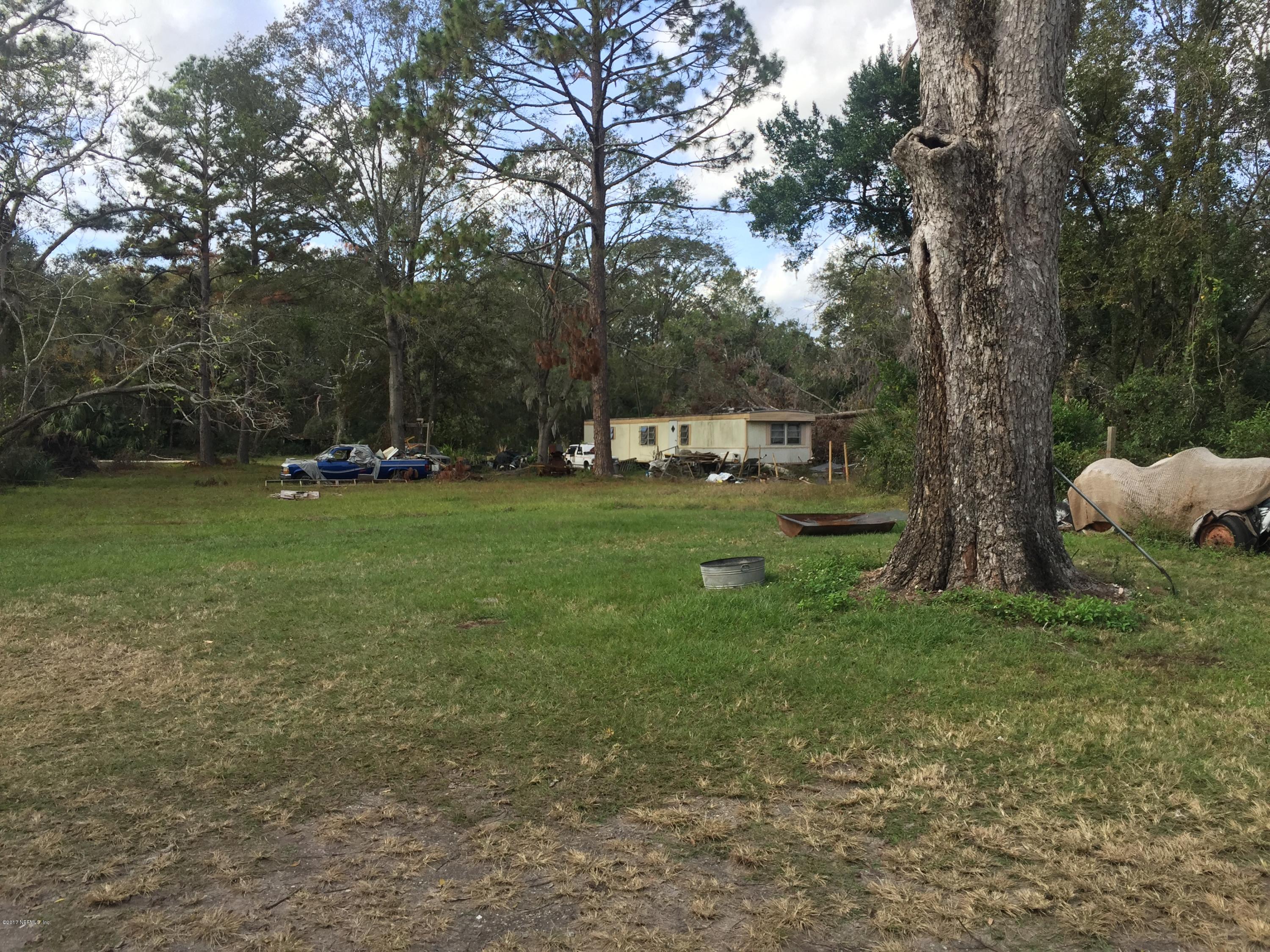 4527 Fennell Road Jacksonville, FL 32244 - Photo 18 of 38 a view of a park with large trees