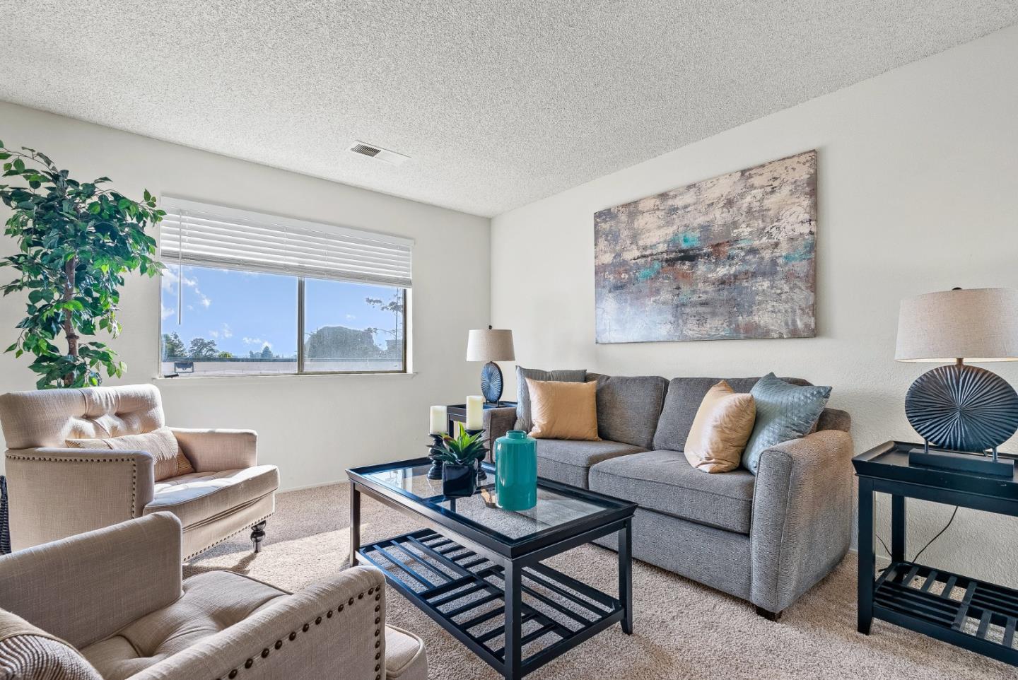 4207 Topsail Court Soquel, CA 95073 - Photo 4 of 19 a living room with furniture and a potted plant