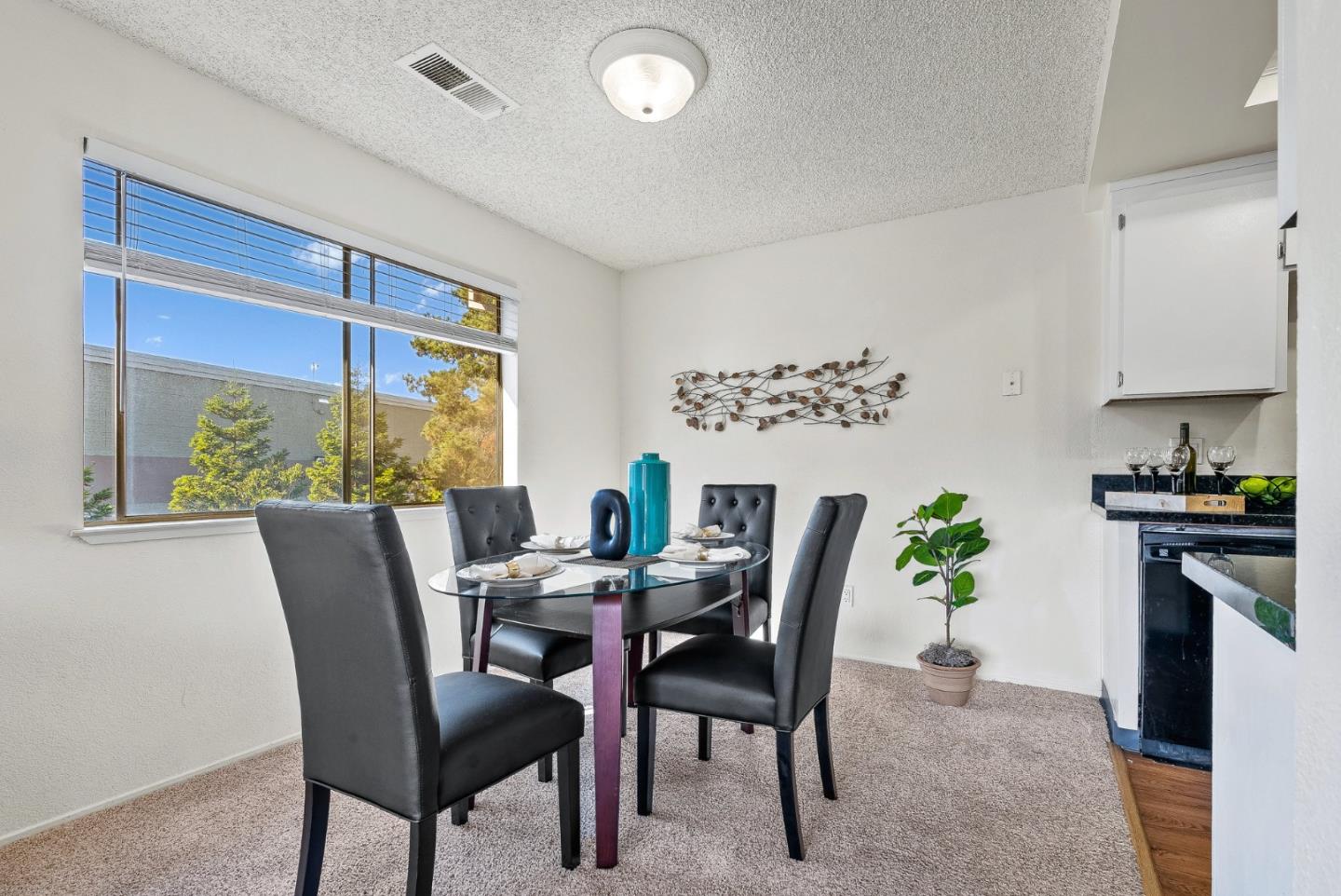 4207 Topsail Court Soquel, CA 95073 - Photo 5 of 19 a view of a dining room with furniture window and outside view