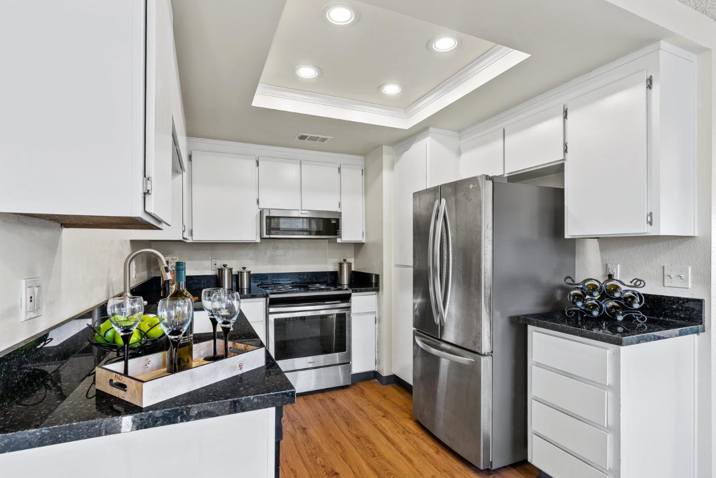 4207 Topsail Court Soquel, CA 95073 - Photo 8 of 19 a kitchen with stainless steel appliances a sink a stove a refrigerator and cabinets