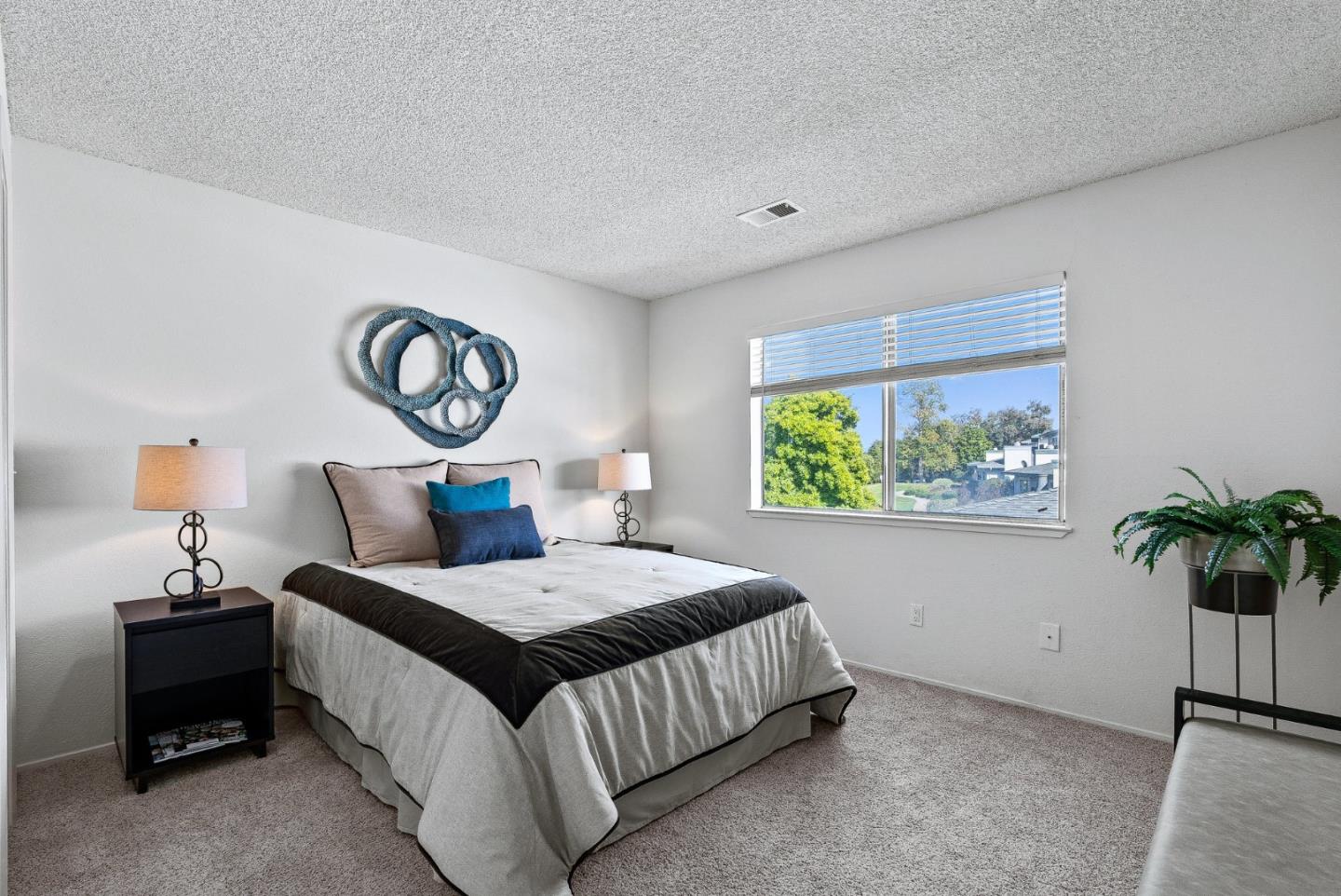 4207 Topsail Court Soquel, CA 95073 - Photo 9 of 19 a bedroom with a bed and a window