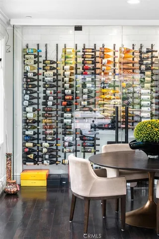 a balcony with table and chairs