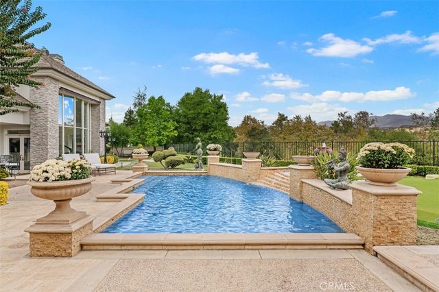 a view of a house with entertaining space