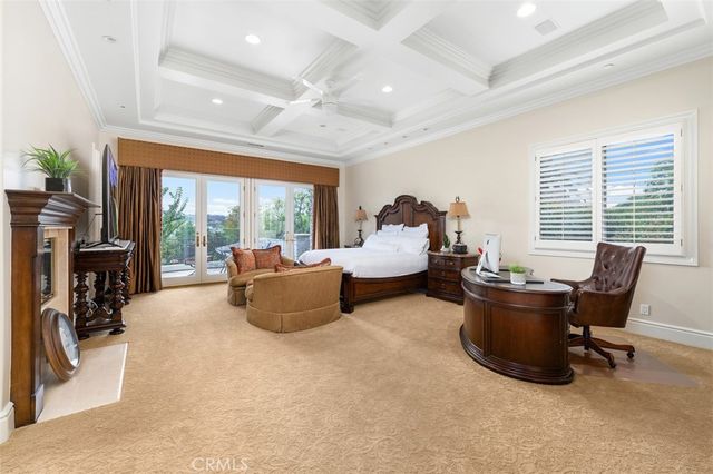 a large kitchen with a sink and a large counter space