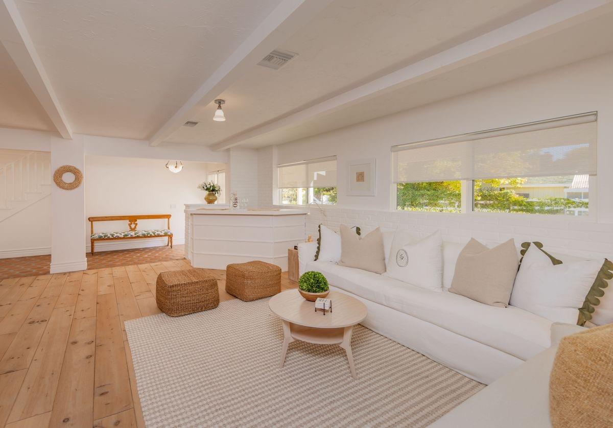 930 Fairview Road Ojai, CA 93023 - Photo 13 of 30 a living room with furniture and a wooden floor