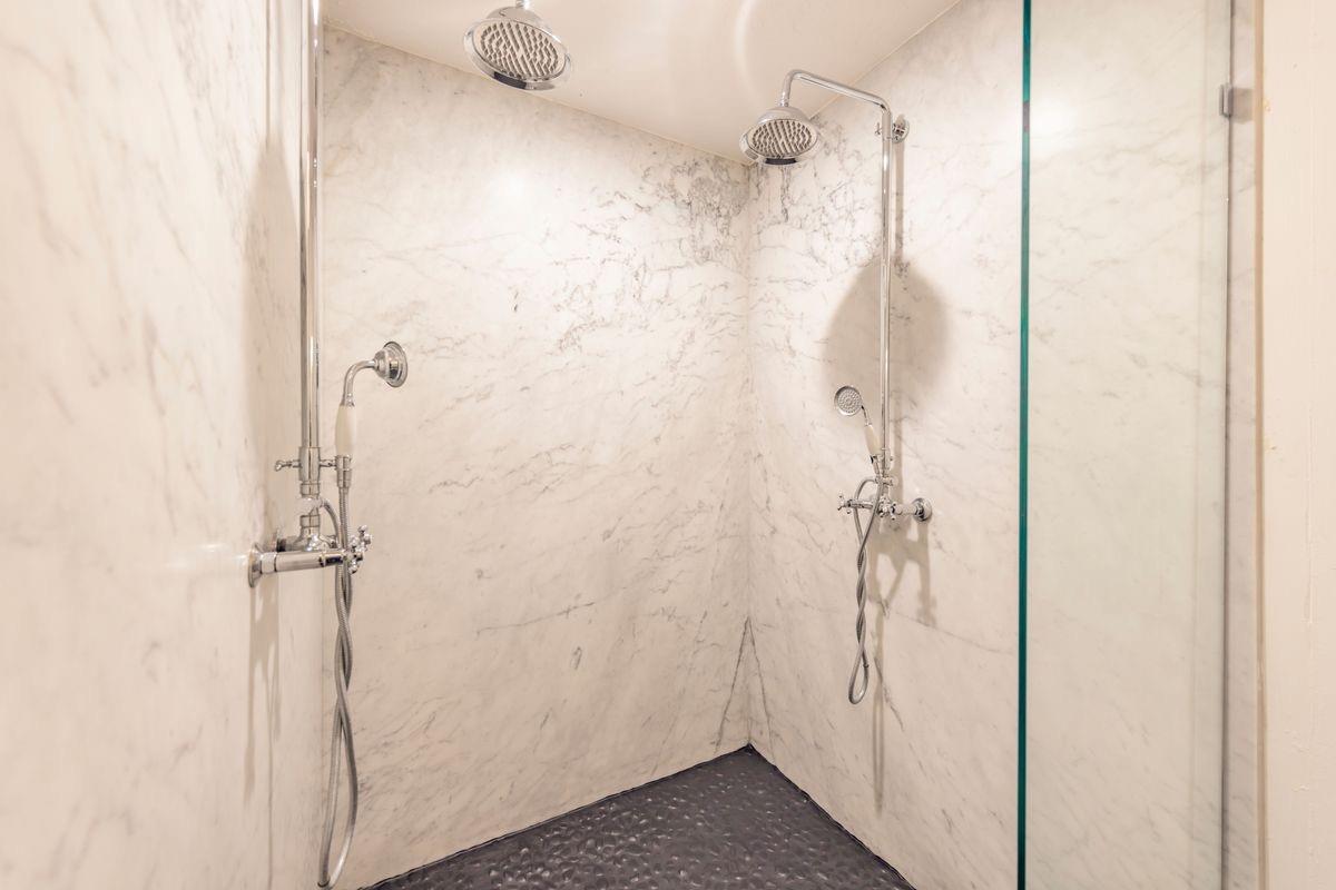 930 Fairview Road Ojai, CA 93023 - Photo 17 of 30 a bathroom with a glass shower door