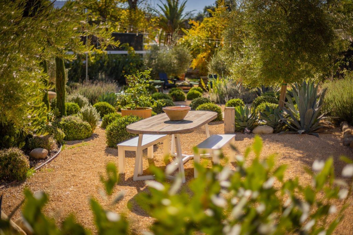 930 Fairview Road Ojai, CA 93023 - Photo 9 of 30 a backyard of a house with table and chairs
