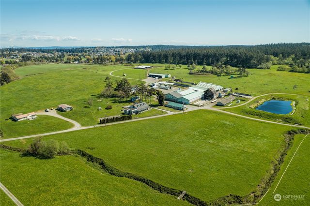 a view of a golf course with a lake