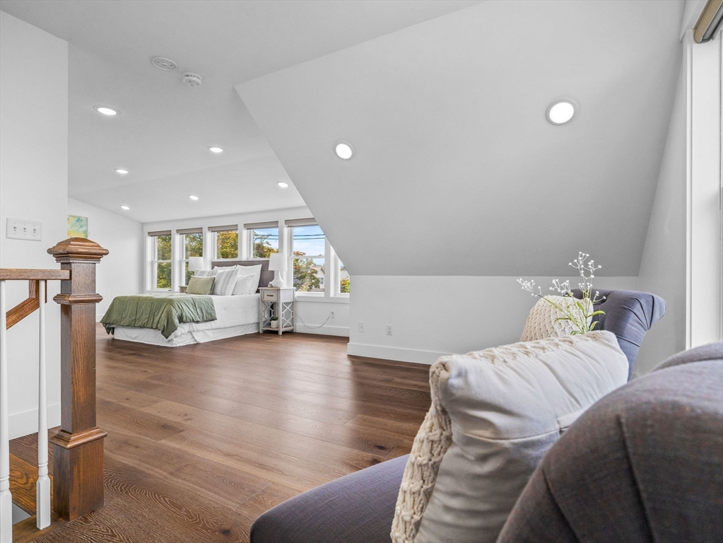 62 Governor Winthrop Road, Unit 2 Somerville, MA 02145 - Photo 11 of 32 a living room with furniture and a table