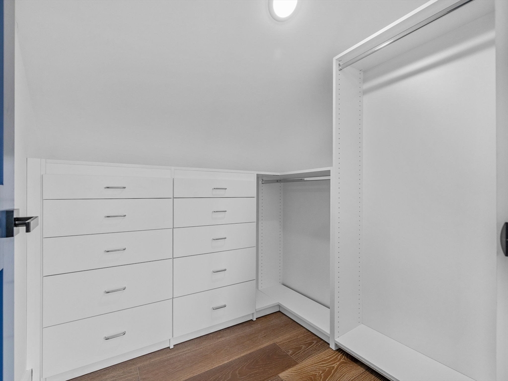 62 Governor Winthrop Road, Unit 2 Somerville, MA 02145 - Photo 13 of 32 a view of an empty walk in closet