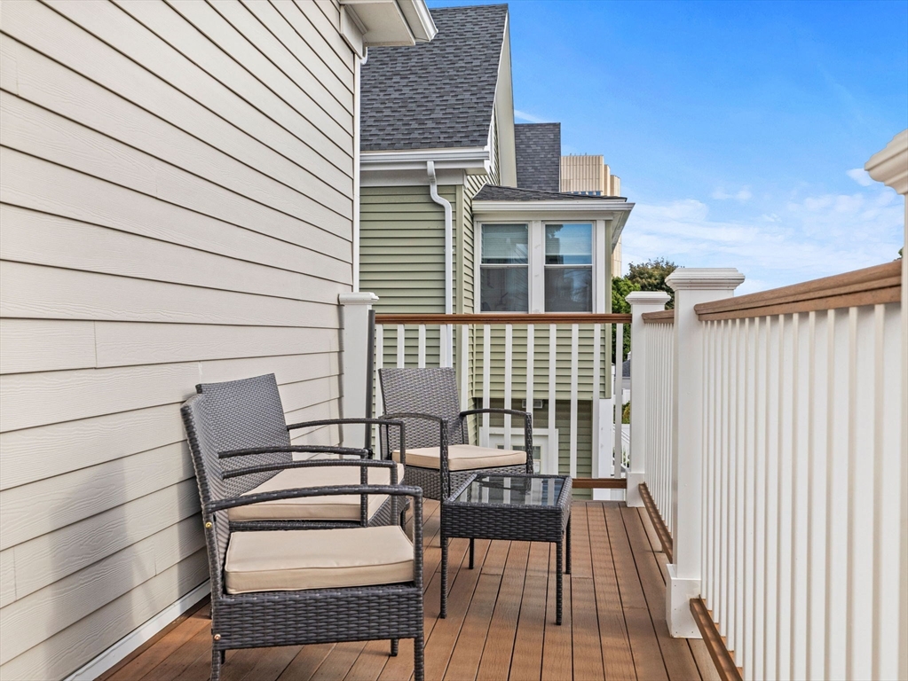 62 Governor Winthrop Road, Unit 2 Somerville, MA 02145 - Photo 24 of 32 a view of outdoor space with seating space