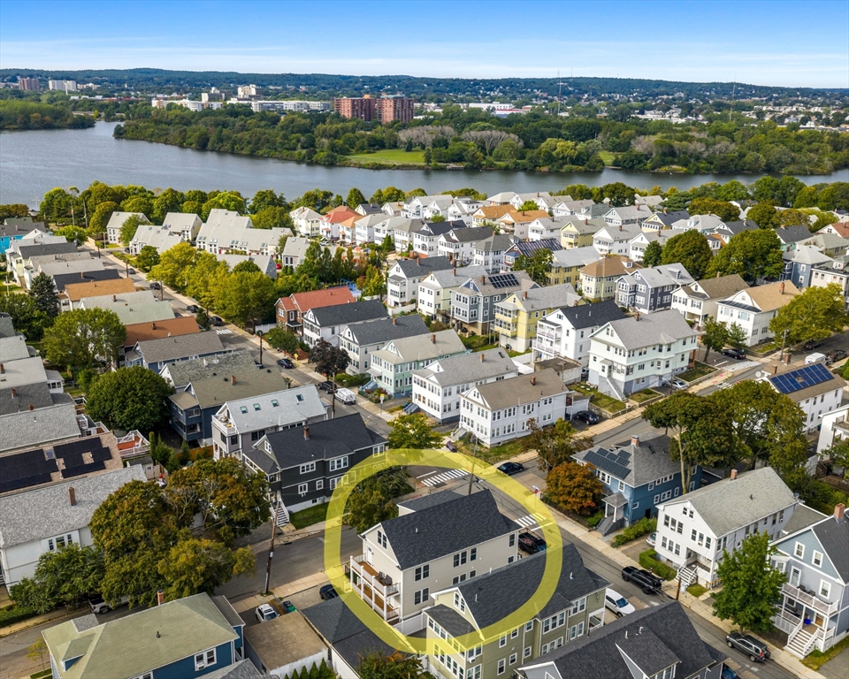 62 Governor Winthrop Road, Unit 2 Somerville, MA 02145 - Photo 31 of 32 an aerial view of a residential houses with outdoor space and river