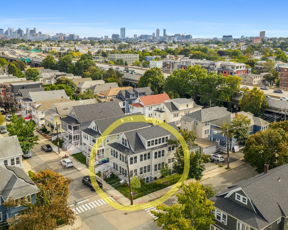 62 Governor Winthrop Road, Unit 2 Somerville, MA 02145 - Photo 32 of 32 an aerial view of a house with a ocean view
