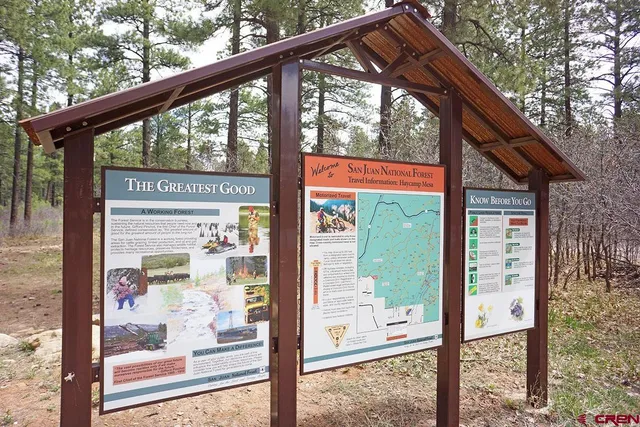 a view of a glass door with a small yard