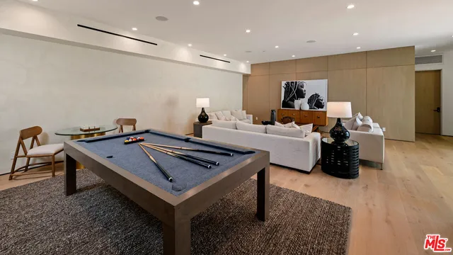 a very nice looking room with a table and a couch