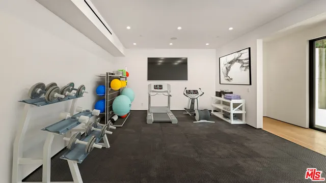 a view of a room with gym equipment
