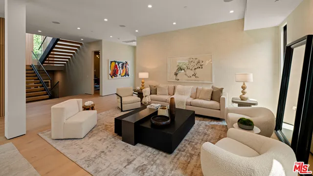 a living room with furniture and a couch