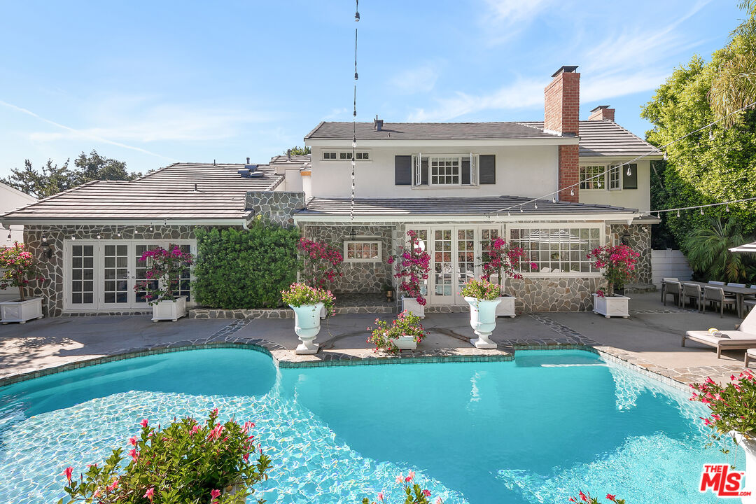 3228 Berry Drive Studio City, CA 91604 - Photo 16 of 40 a front view of a house with garden
