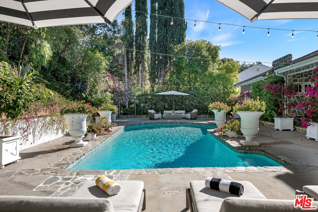 3228 Berry Drive Studio City, CA 91604 - Photo 18 of 40 a view of a chair and tables in the patio