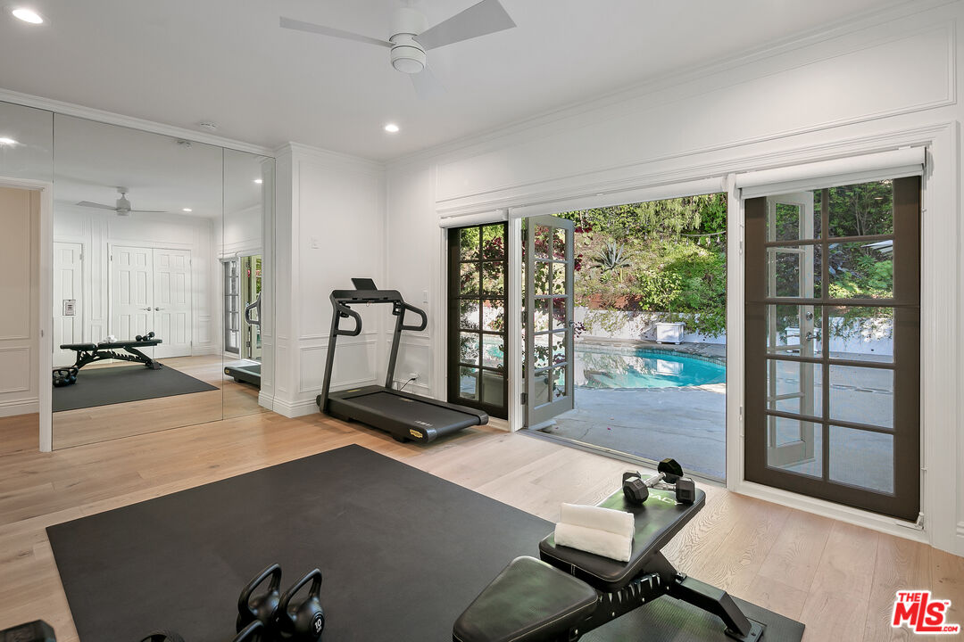 3228 Berry Drive Studio City, CA 91604 - Photo 20 of 40 a room with gym equipment and large window