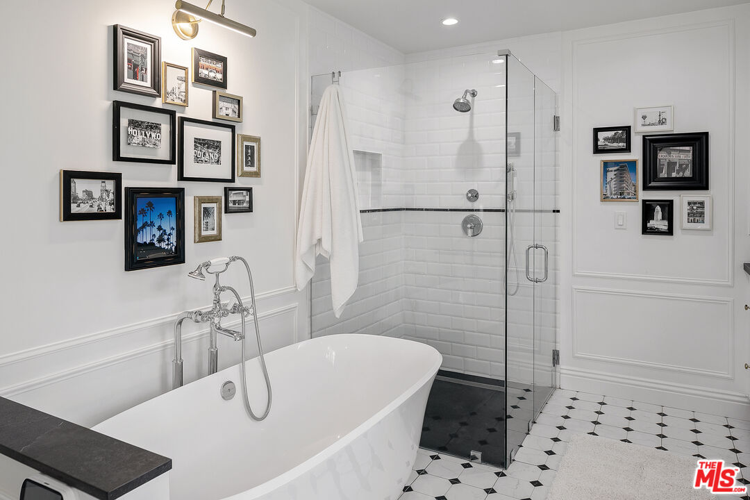 3228 Berry Drive Studio City, CA 91604 - Photo 27 of 40 a bathroom with a bathtub and a shower