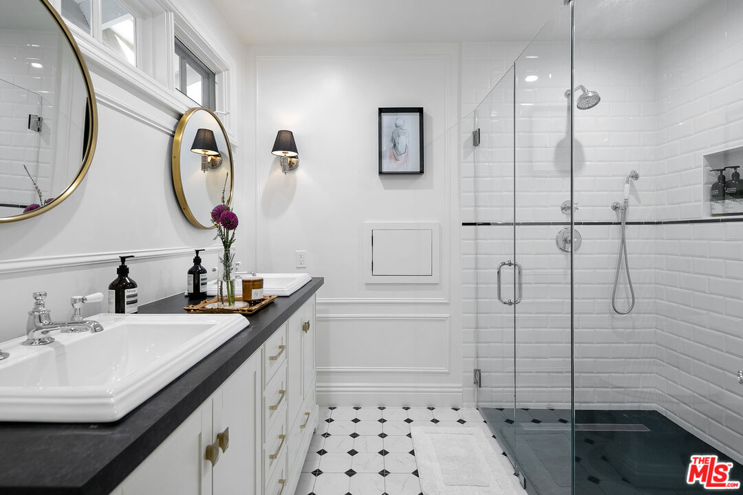 3228 Berry Drive Studio City, CA 91604 - Photo 34 of 40 a bathroom with a double vanity sink mirror and toilet