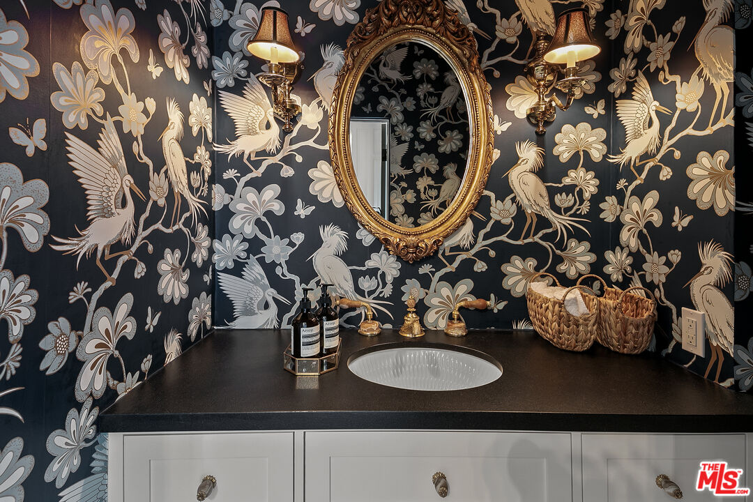 3228 Berry Drive Studio City, CA 91604 - Photo 6 of 40 a bathroom with a sink and mirror